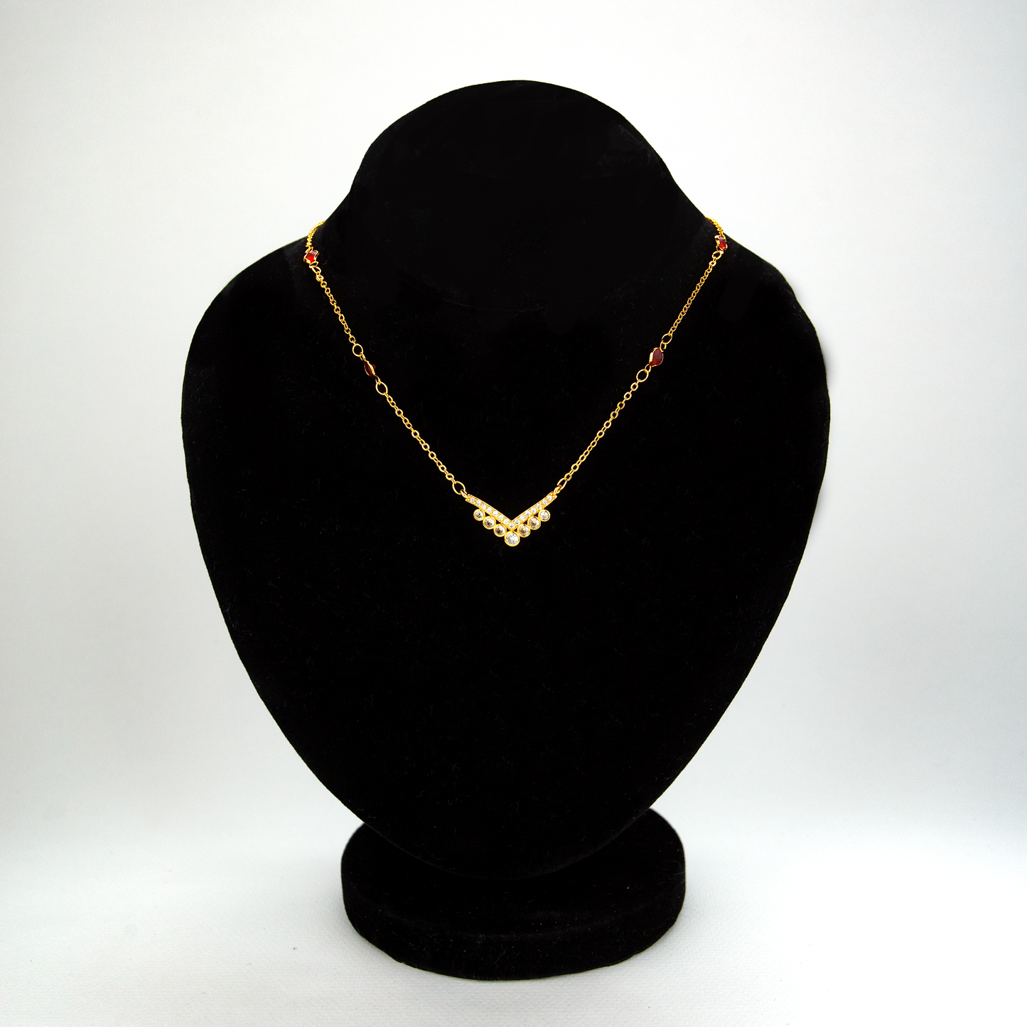 Golden Zircon Necklace With Red Stones On The Chain