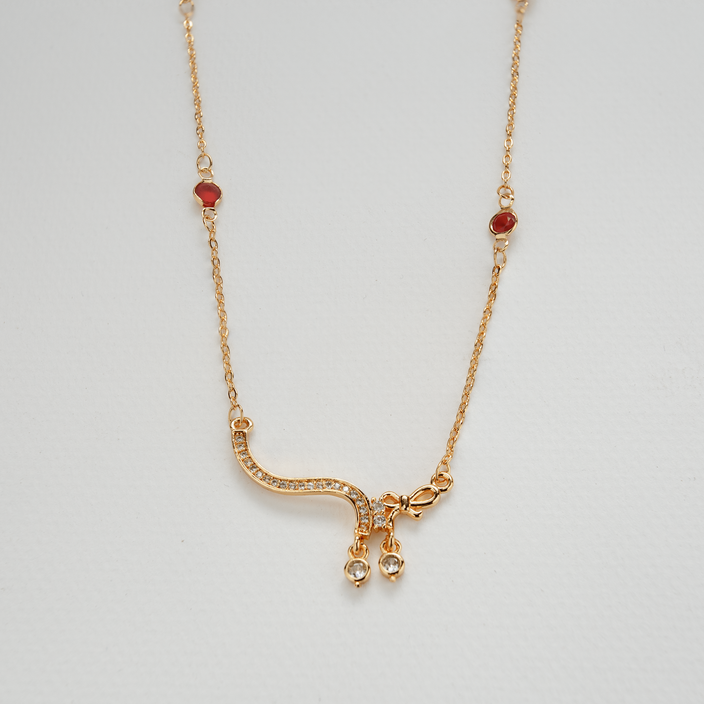 Golden Necklace With Stones On The Chain